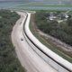 A U.S. Border Patrol vehicle patrols next to a fence at the U.S.-Mexico border on Jan. 5, 2017, near McAllen, Texas. The number of incoming immigrants has surged ahead of the upcoming presidential inauguration of Donald Trump, who has pledged to build a wall along the U.S.-Mexico border.
John Moore/Getty Images)